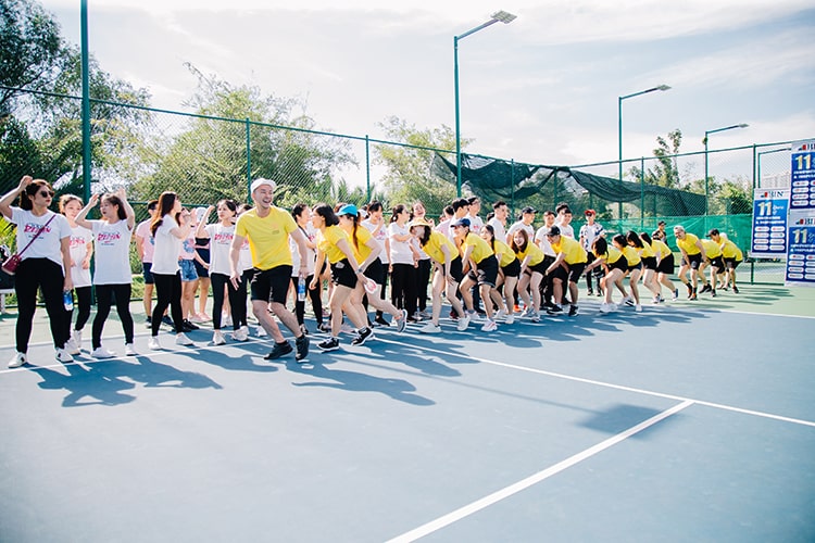 Teams lined up to take turns preparing to enter the outdoor activity area Teams lined up to take turns preparing to enter the outdoor activity area