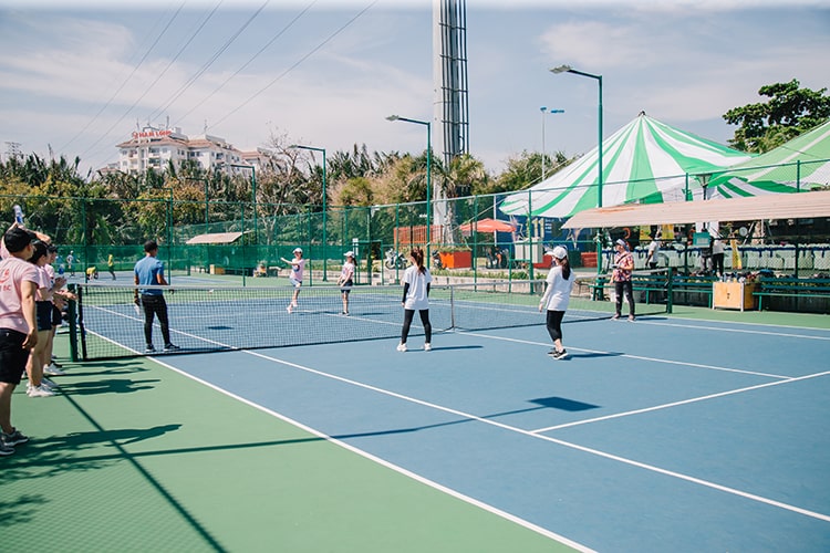 The shuttlecock competition game between One IBC and Accounting-HR female teams The shuttlecock competition game between One IBC and Accounting-HR female teams